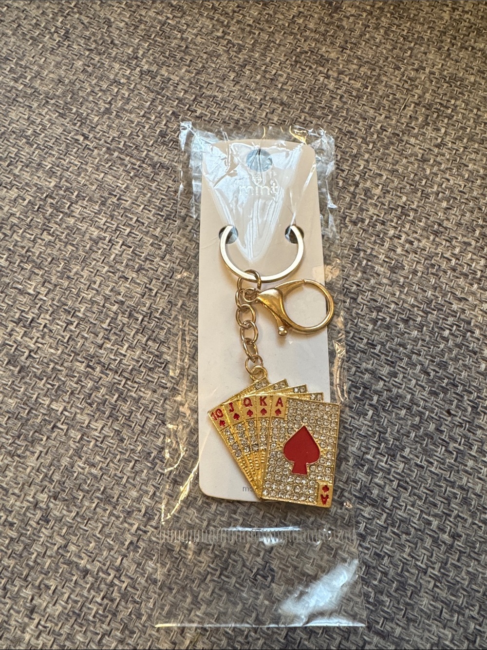 Mint Gold-tone Rhinestone Poker Hand Keychain with Red Accent